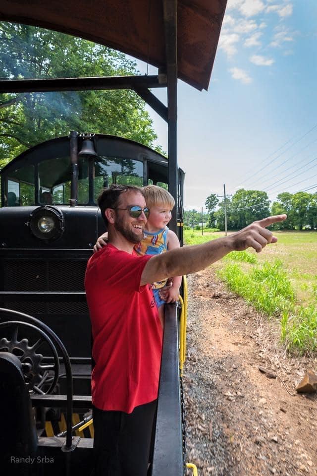 Father with son on a train
